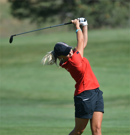 Golfer mid-swing — hip pain treatment